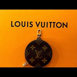Louis Vuitton Monogram round coin purse.